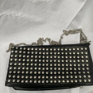 Black purse from H&M. Silver chain. Great condition